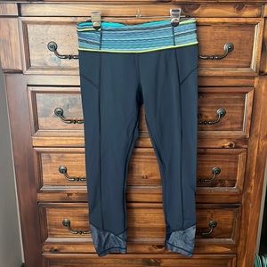 Lululemon navy 3/4 leggings w/waist trim and cute ankle detail